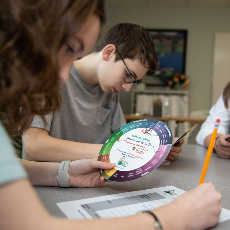 Student playing Claim Your Future with wheel